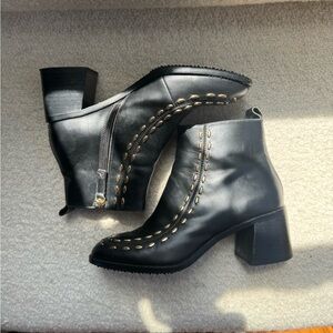 Black studded ankle booties from anthro